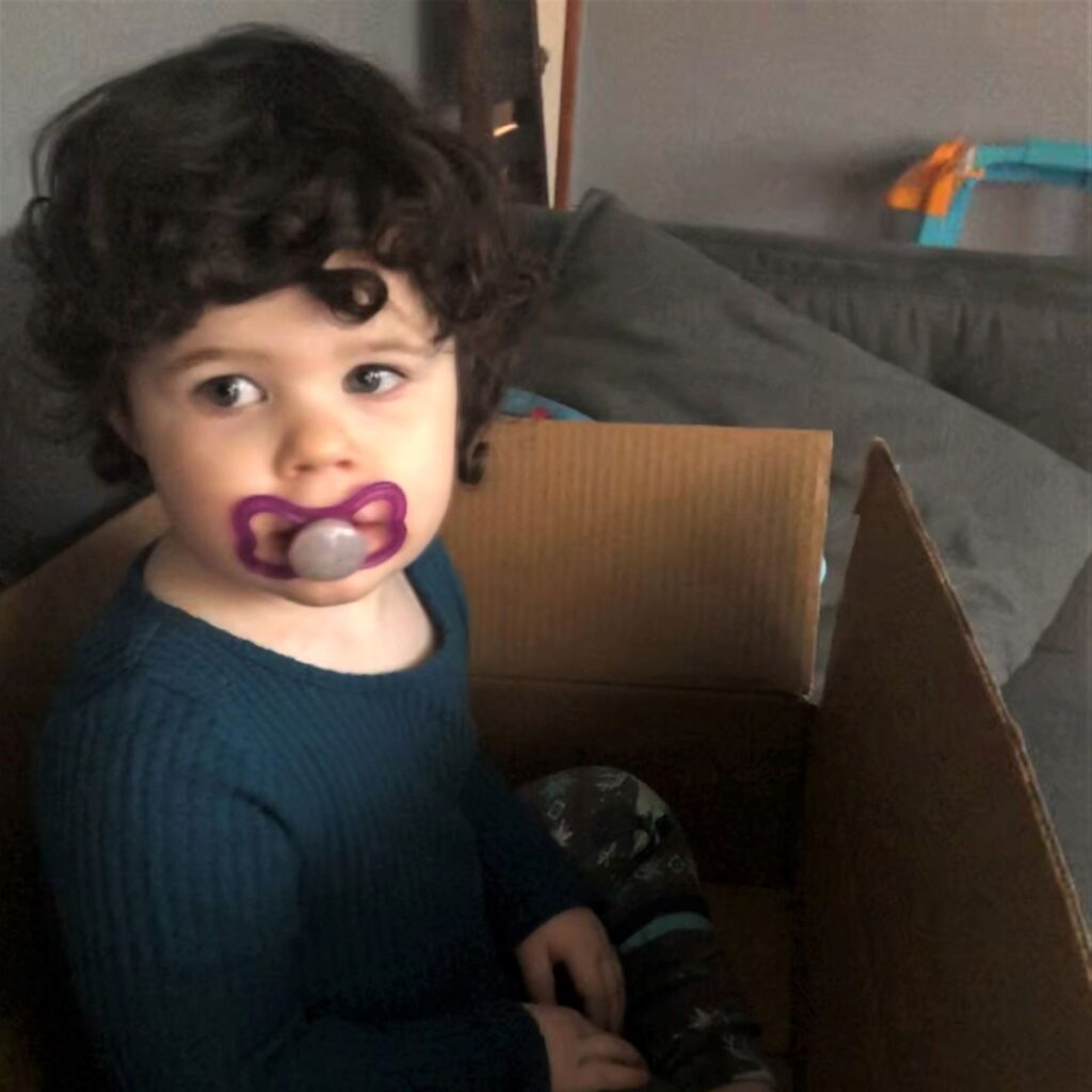 cardboard box toddler in a box